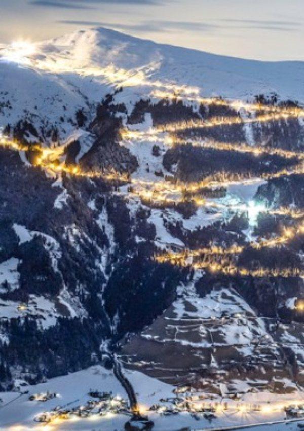 Rodeln auf der längsten beleuchteten Rodelbahn der Welt