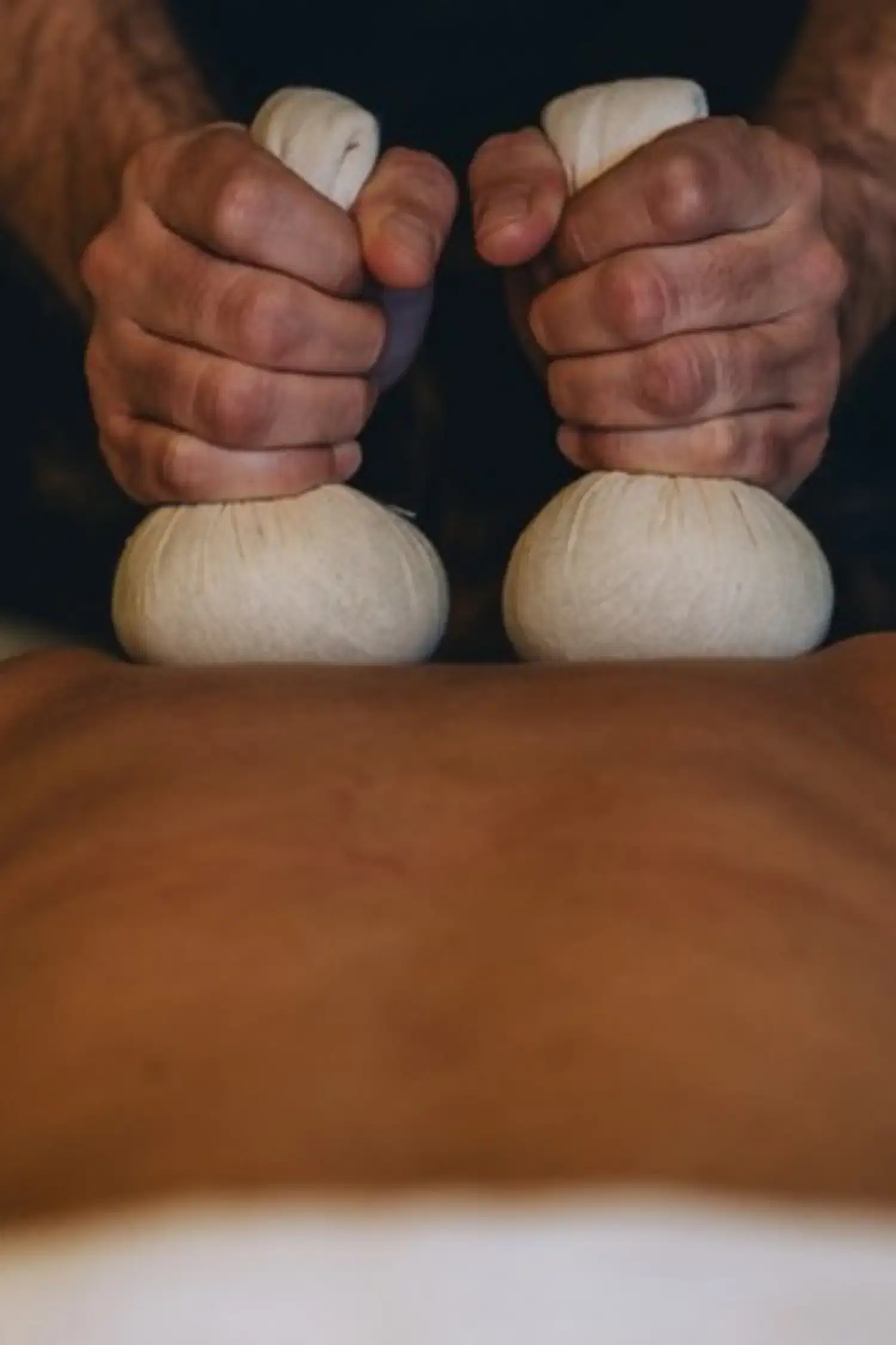 Kräuterstempelmassage