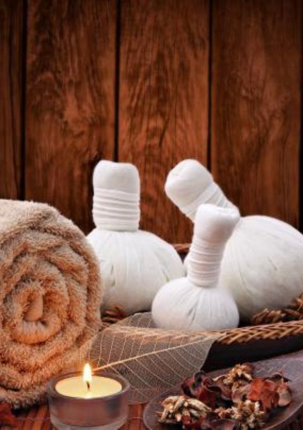 Kräuterstempel-Massage