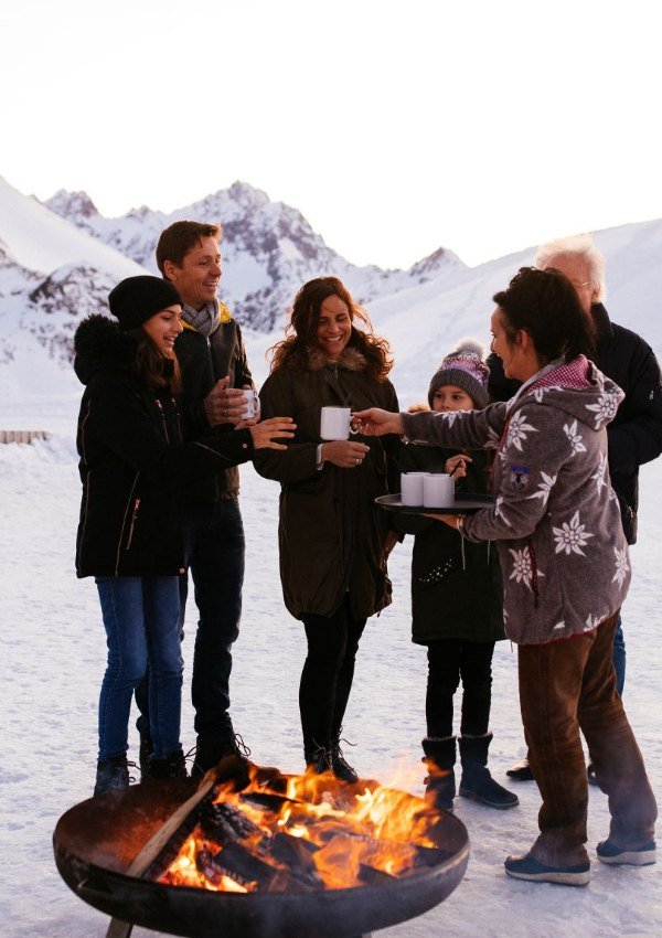 Christmas team party around the campfire