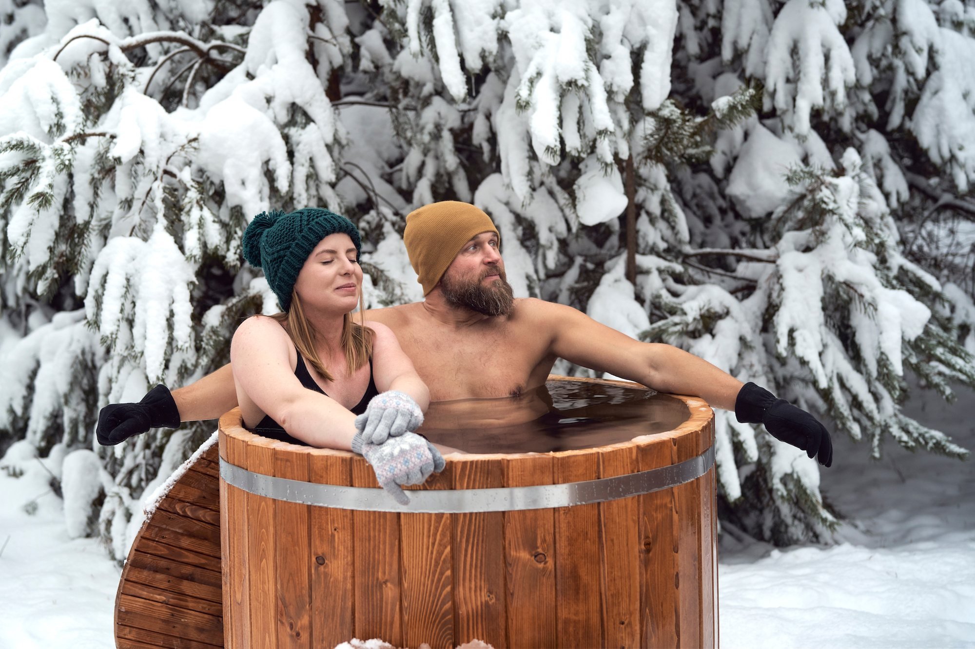 Private hot tub & sauna in the winter forest