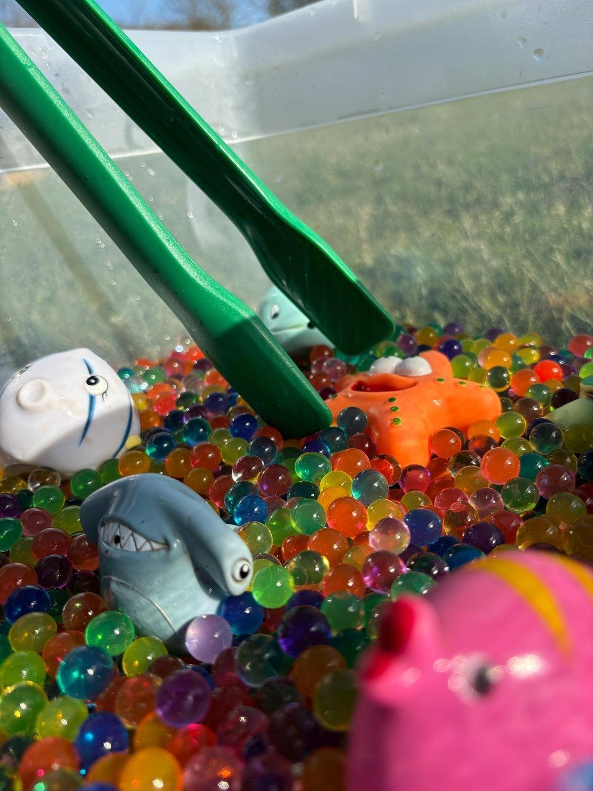Scooping water beads